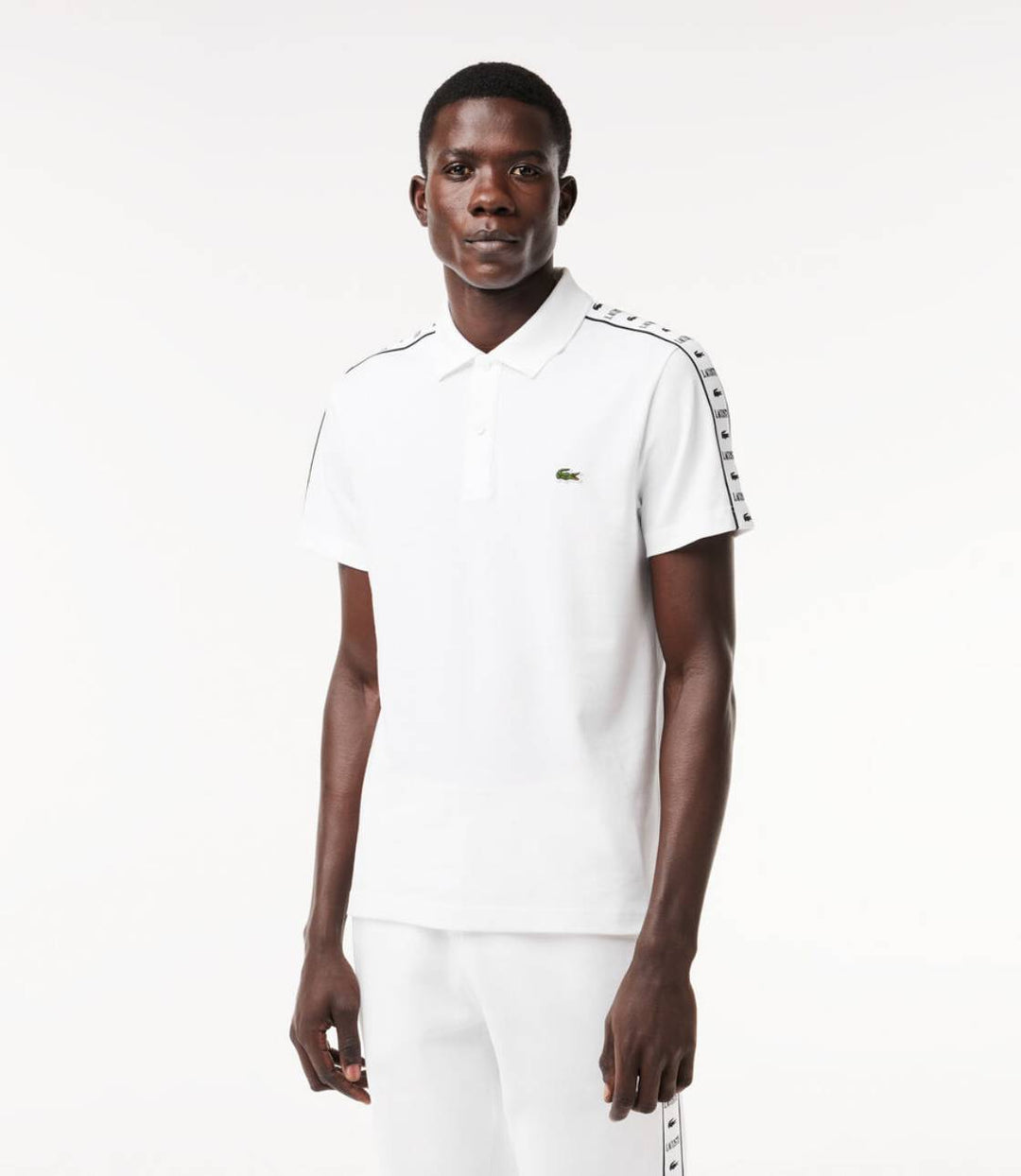 Polo Lacoste à bande grifféé blanc